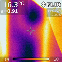Missing wall insulation is revealed.